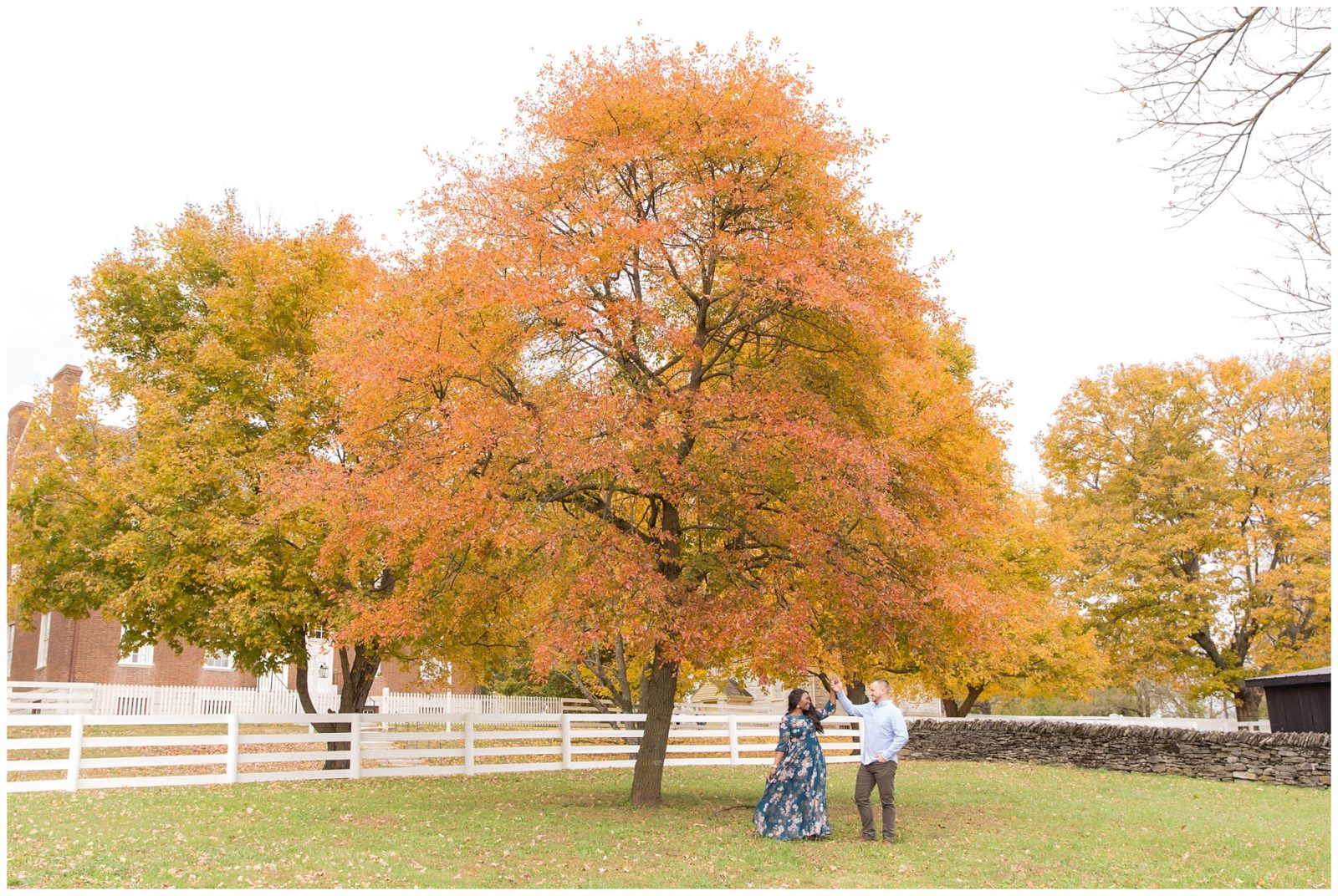Fall engagement session with fall colors at Shaker Village in Harrodsburg, Kentucky.