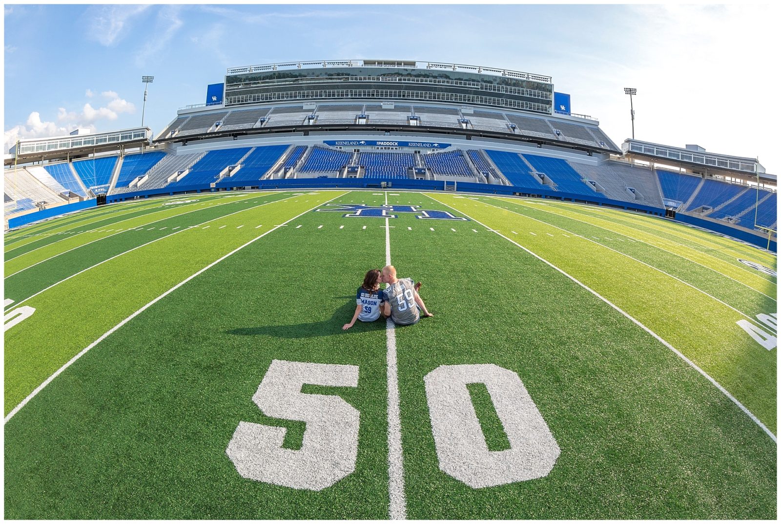 Engagement session at Commonwealth Stadium with former University of Kentucky football player Kelly Mason & his fiancee Jalyn. Photo by Kevin and Anna Photography www.kevinandannaweddings.com