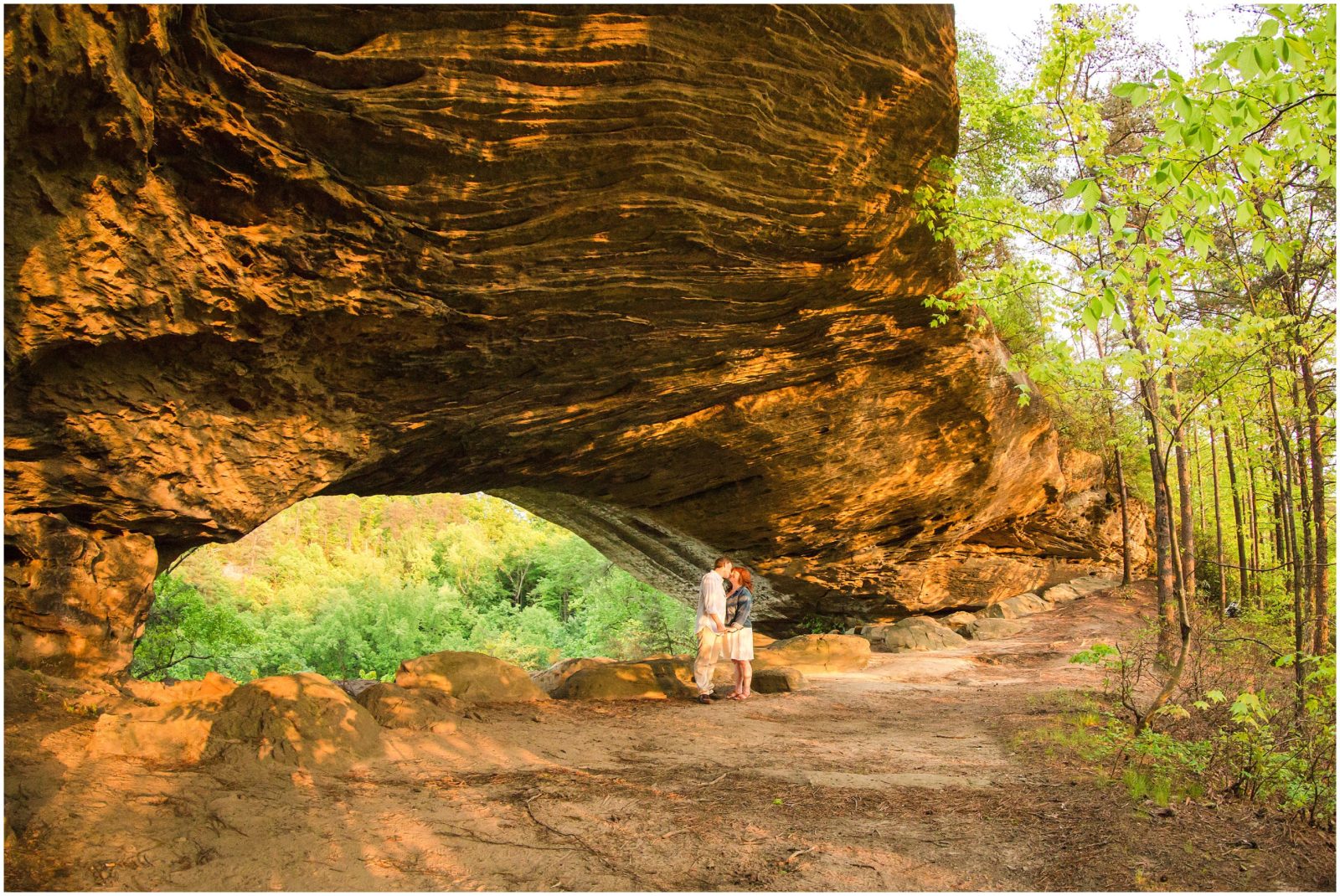 Couple at Star Gap Arch during their engagement session in the Red River Gorge