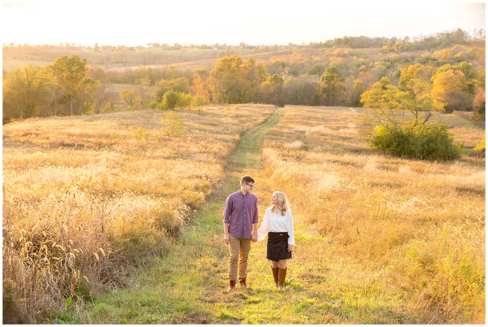Sunset engagement session in a field at Shaker Village in Harrodsburg, Kentucky.